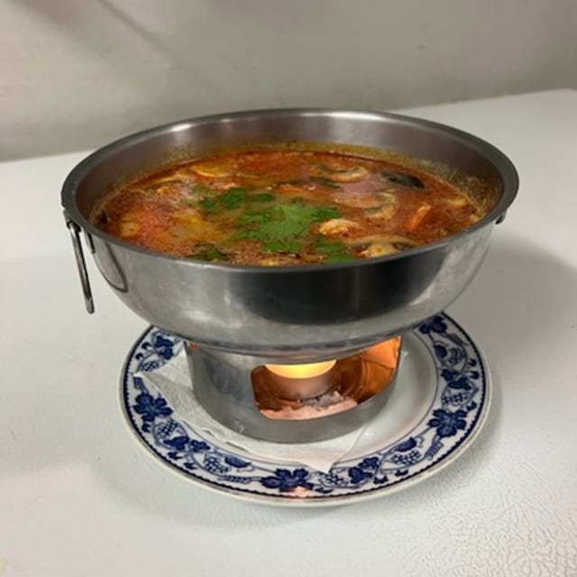 Creamy Tom Yum Soup with Seafood.